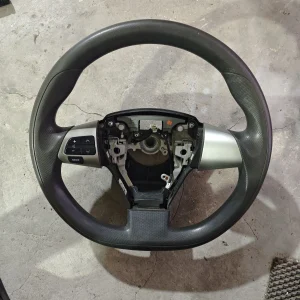 Suitable for 12 Toyota Corolla leather multi-function steering wheel volume button fixed speed cruise button car removal parts